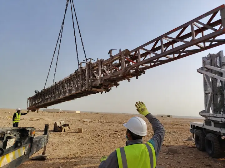 COW mast section lifted into position