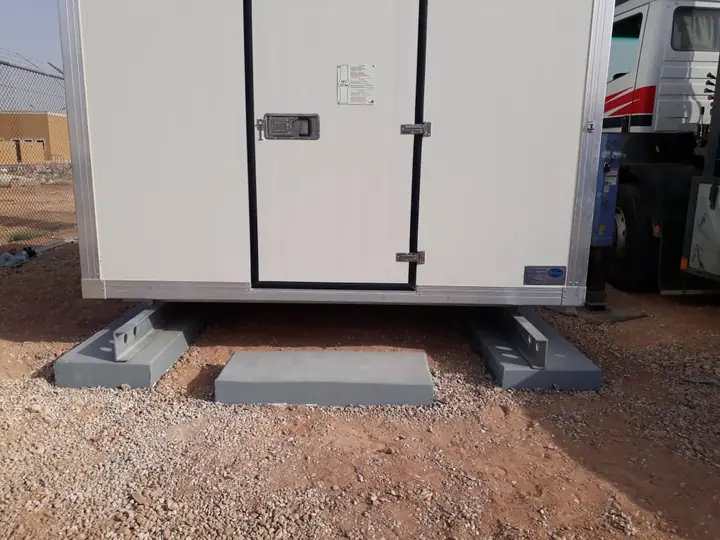 Shelter positioned on its foundation
